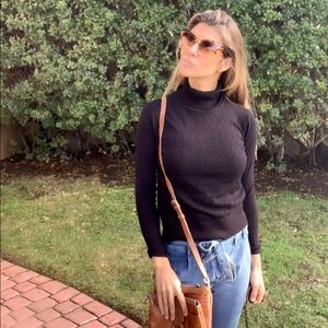 Black turtle neck sweater with design